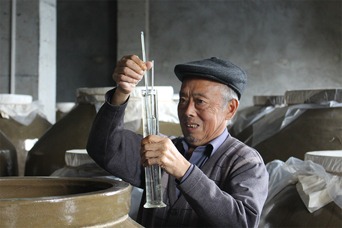 名谷酒業創始人—李明發